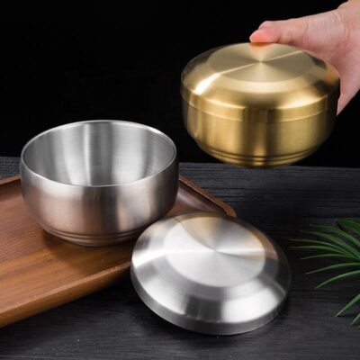 stainless steel bowl with silver and gold lid