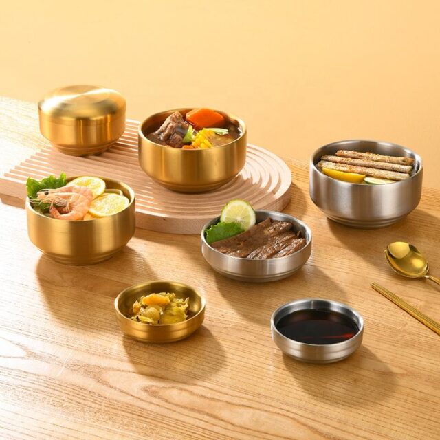 stainless steel bowl with silver and gold lid