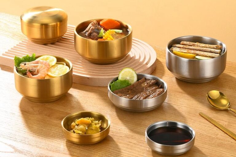 stainless steel bowl with silver and gold lid