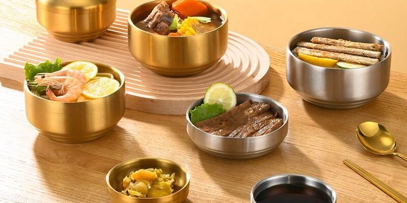 stainless steel bowl with silver and gold lid