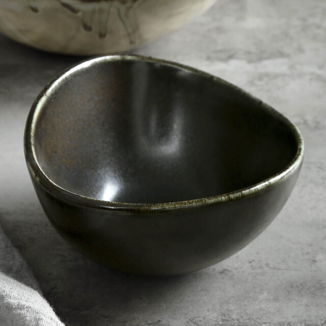 Matte black ceramic bowl with porcelain