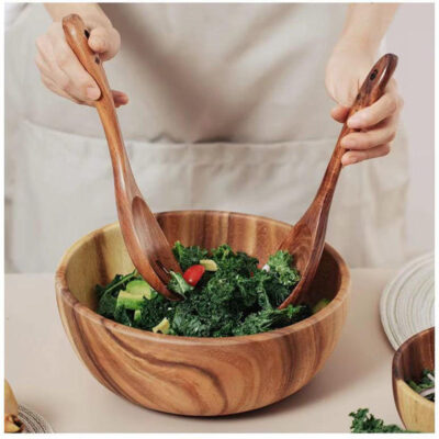 wood salad bowl with wooden spoon