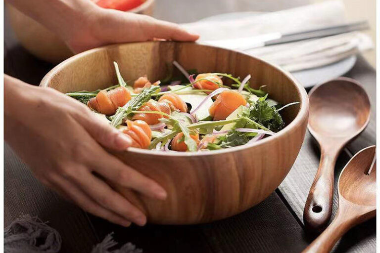 wood salad bowl with wooden spoon