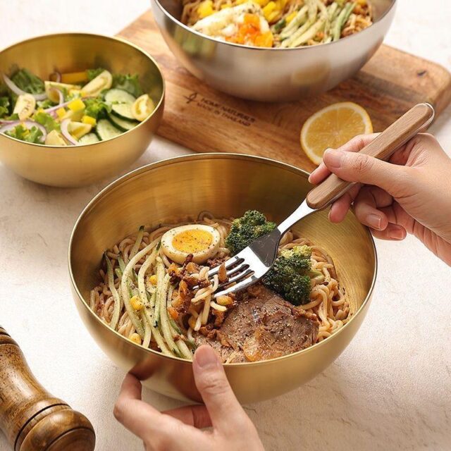 Golden round stainless steel salad bowl