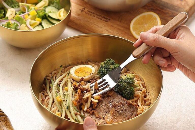 Golden round stainless steel salad bowl