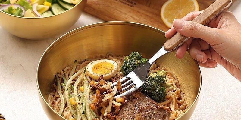 Golden round stainless steel salad bowl